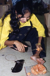 Poornima Shantharam braiding flowers - Jacksonville, Florida.