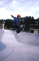 Skateboarder performing an aerial move - Jacksonville, Florida.