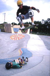 Unknown skateboarder jumps over another skateboarder - Jacksonville, Florida.