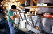 Rickey Doublerly knitting a fishing net - Jacksonville, Florida