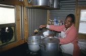 Pleasant Jenkins serving pilau rice - Jacksonville, Florida