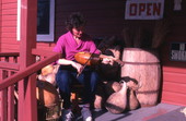 Linda Beth Waldron playing a gourd fiddle she made - White Springs, Florida