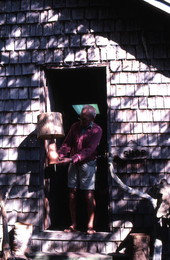 Tom Gaskins holding a cypress lamp at his Cypress Knee Museum - Palmdale, Florida