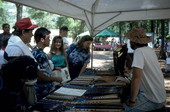 James Brock displaying his bamboo flutes at the 1992 Florida Folk Festival - White Springs, Florida
