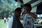 Teddrick Moore styling hair at the 1991 Florida Folk Festival - White Springs, Florida