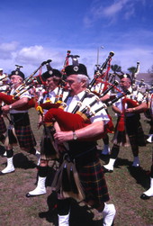 View of a Scottish pipe band performing at the Highland Games in Dunedin, Florida.