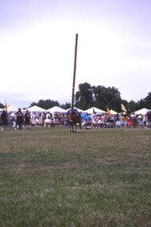 Competitor preparing to "turn the caber" during the Highland Games in Dunedin, Florida.