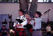 View of Scottish bagpipe players at the Highland Games in Dunedin, Florida.