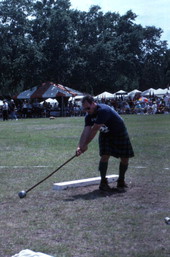 Participant preparing to throw the hammer during the Highland Games in Dunedin, Florida.