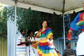 Neri Torres dancing with Cuban dance and music ensemble Ife-Ile during a performance at the Historical Museum of Southern Florida's Harvest Festival in Miami, Florida.