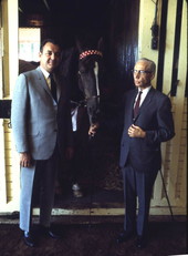 Portrait of Governor Claude Kirk, left, at a horse farm