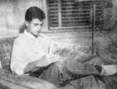 Spessard L. Holland Jr. reading the newspaper