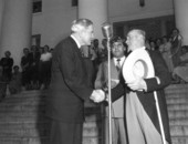 Governor Fuller Warren greeting a colonel from Kentucky - Tallahassee, Florida.