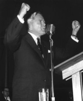Former governor Fuller Warren speaking at the microphone