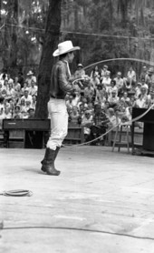 View showing trick roper Danny Coflin performing at the 1970 Florida Folk Festival - White Springs, Florida.