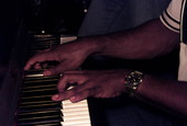 Close-up view of piano being played during band performance - Tallahassee, Florida.