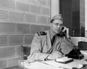 View of Lt. Joe J. Steinmetz talking on the phone at NAS Pensacola.