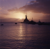 Silhouettes of ships shown during sunset in Sarasota, Florida.