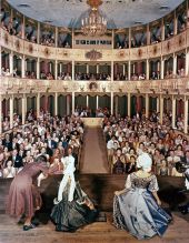 Interior view showing audience applauding for the Asolo Theater cast members on stage.