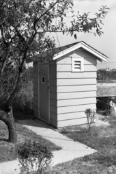 View of an outhouse.