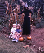 View showing Carolyn Steinmetz, dressed as a witch for Halloween, with children in Sarasota, Florida.