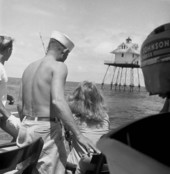 View showing the photographer's daughter Lois Duncan Steinmetz fishing from aboard the charter boat "Tramp".