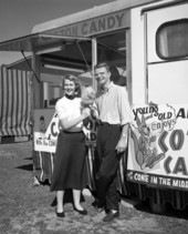 Sarasota High School notable students Kathryn Summers and Ernie Thomas posing with cotton candy in Sarasota, Florida.