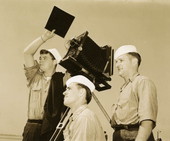 Naval Photography School students with camera on a tripod at NAS Pensacola.