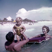 Nelson family in the Gulf with a raft near Sarasota, Florida.