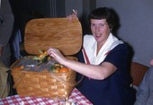 Unidentified woman with a basket of oranges in Sarasota, Florida.