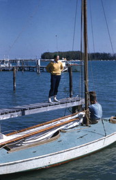People with their sailboat at a city dock in Sarasota, Florida.