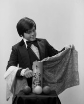 Jose Rey performing a magic trick in Sarasota, Florida.