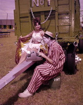 View showing aerialist Carmen del Molino with Bob-O the clown on the grounds of the Circus Hall of Fame in Sarasota, Florida.