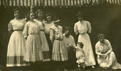 Postcard showing group portrait of Koreshan Imogene Bubbett Rahn, second from right, with friends.