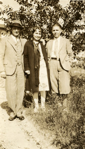 Portrait of Mr. & Mrs. Gregory with their son.