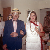 People in costume posing at a Koreshan Unity Halloween party.