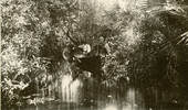 Men in a rowboat on the Indian River.