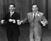 Jackie Gleason and chief writer Marvin Marx aping a past U. S. President