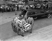 Casket of Dan McCarty being carried into Capitol for lying in state