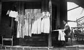 Home demonstration club member Mrs. Hancock with sewing display - Aucilla, Florida