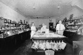 Earle and Leita Winston inside their store - Clermont
