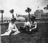 Three women on lawn in front of Continental Hotel - Atlantic Beach