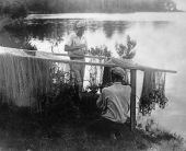 Men repairing nets on Mack Bayou near DeFuniak Springs, Florida
