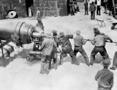 Florida National Guard members loading a cannon - Florida