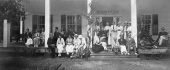 Guests on the porch of the main cottage.