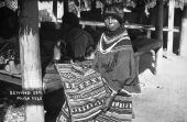 Young woman sewing at Musa Isle - Miami, Florida