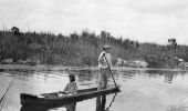 Seminoles in canal bordering the Tamiami Trail - Everglades, Florida