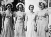 4 women holding hands outside - Miami, Florida