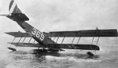 Airplane nose down in the surf - Naval Air Station Pensacola.