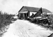 Minister's home deposited on the railroad tracts by the hurricane